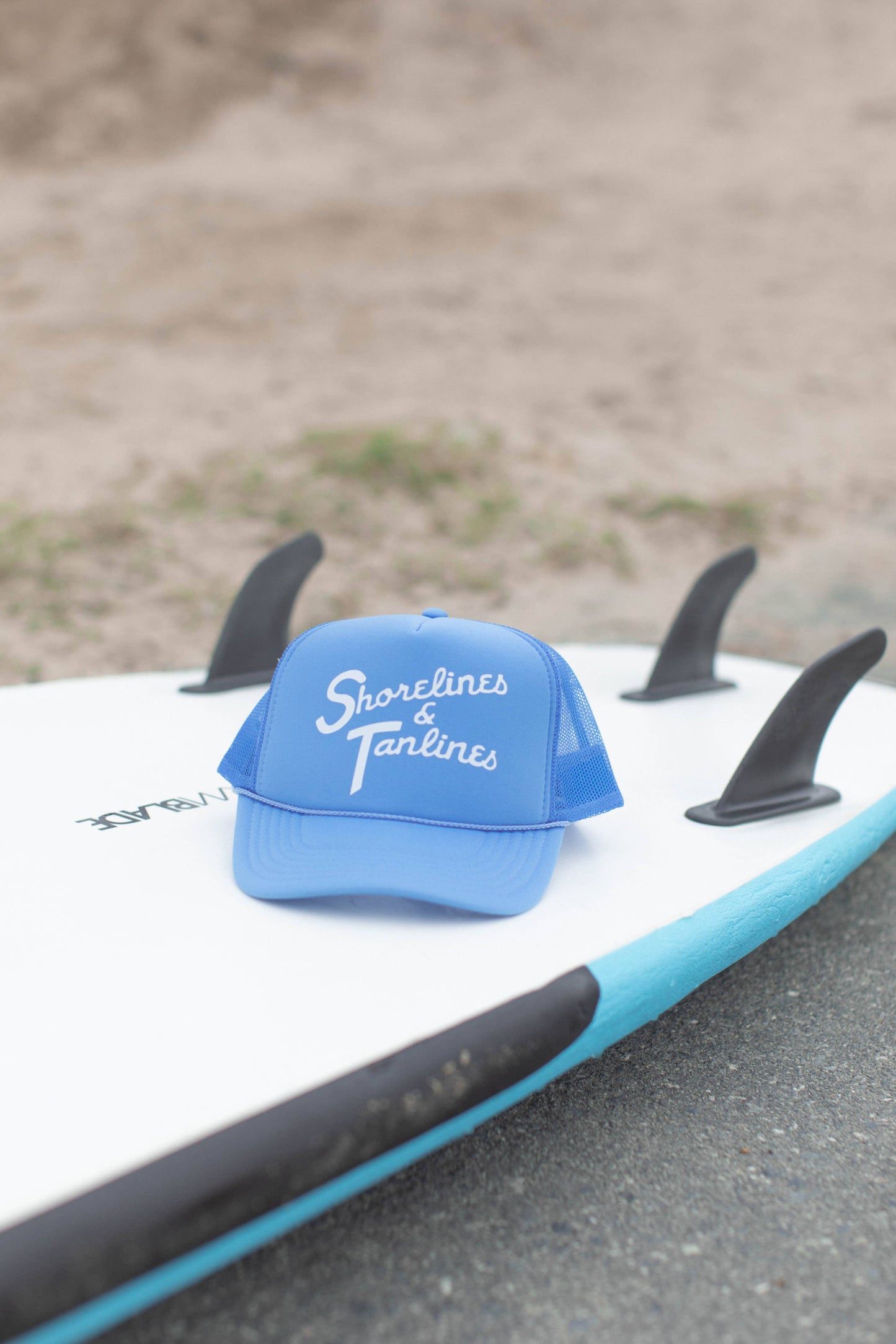 Shoreline Tan Line Summer Trucker Hat: College Blue