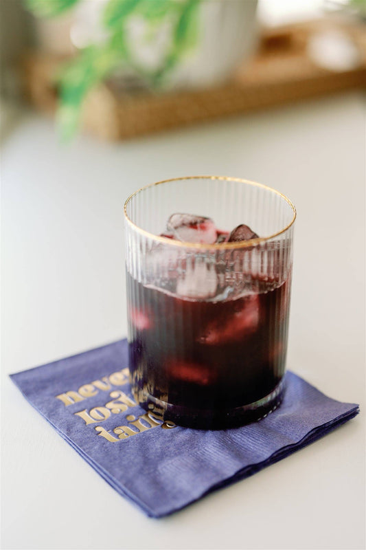 "Never Lost a Tailgate" gold foil + purple napkin pack